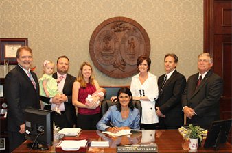 The Saylor family with Governor Nikki Haley and state legislators